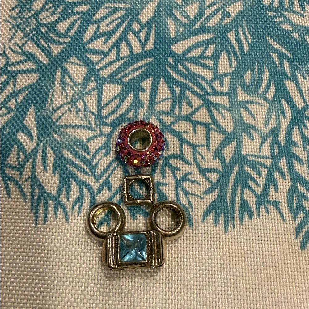 Silver and Blue Bead, 3 Spacer Beads one Pink Crystal Bead.